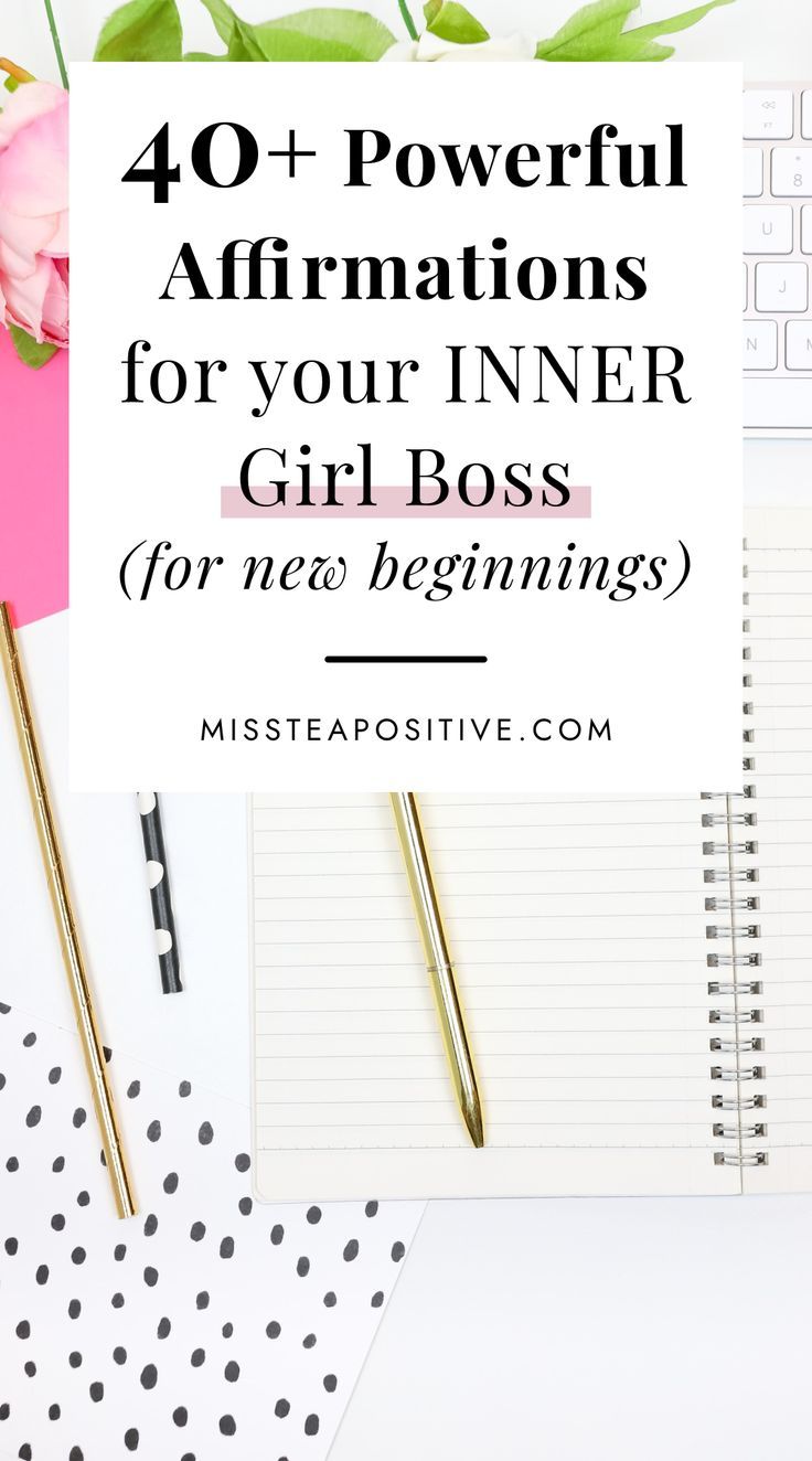 a desk with flowers, notebook and pen on it that says 40 powerful affirmationss for your inner girl boss for new beginnings