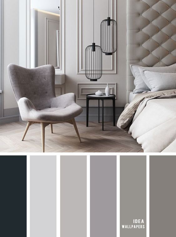 a bedroom with gray and white colors in the color scheme, which is very similar to grey