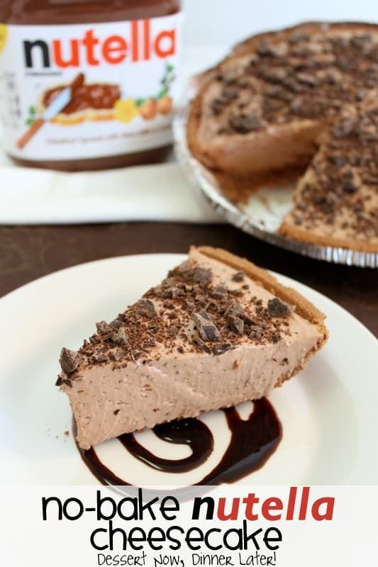 a piece of pie on a plate with chocolate sauce and nutella in the background