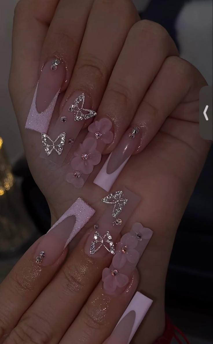 Pink French Tip With Butterflies, Pink French Tip Nails With Butterflies, Nail Ideas 3d Flowers Pink, Pink Rose Gold Quince Nails, 3d Flower And Butterfly Nails, Pink French Tip Nails With 3d Flower, Quince Nails Flowers, Acrylic Nail Butterfly Designs, Nail Inspo With Butterflies