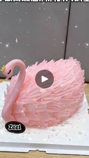 a pink cake that is shaped like a flamingo