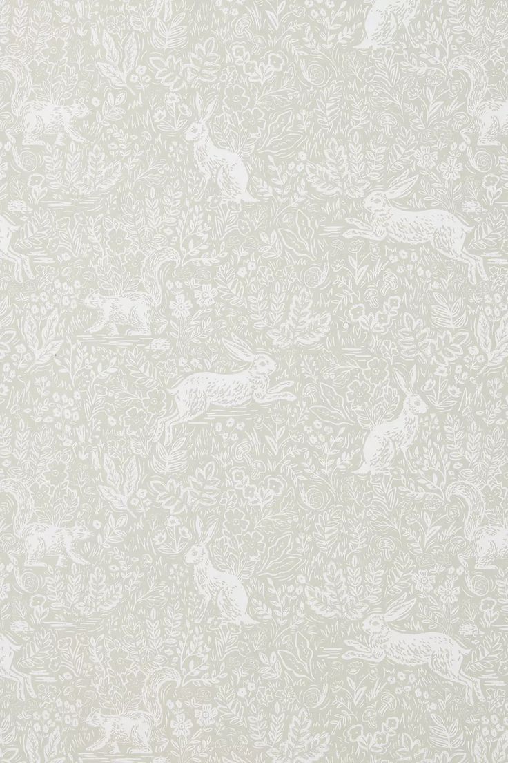 a white wallpaper with deers and flowers on it