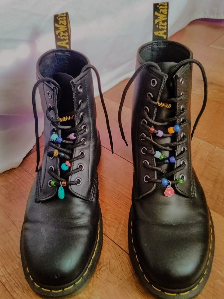 Charms On Docs, Hippie Shoes Boots, Doc Martens With Beads, Goth Hobbit Aesthetic, Doc Marten Charms Diy, Boot Charms Diy, Doc Marten Charms, Whimsigothic Jewelry, Whimsigoth Diy