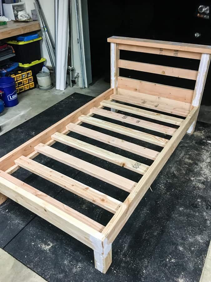 the bed frame is made up and ready to be built into someone's house