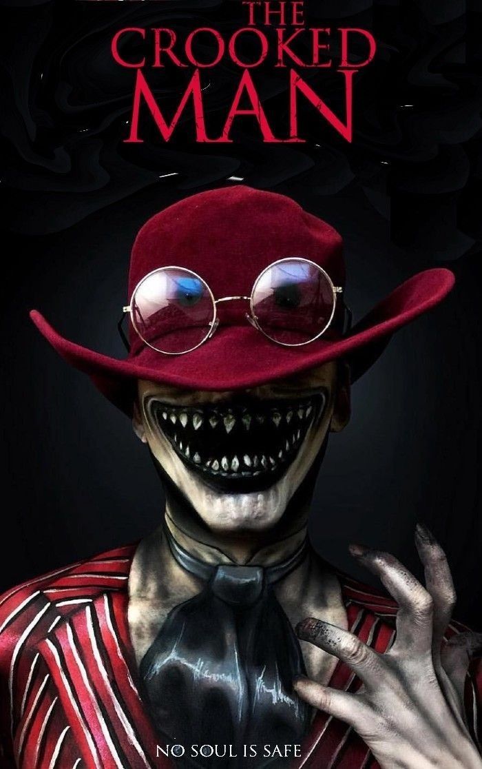 the crooked man movie poster with an evil looking person wearing glasses and a red hat