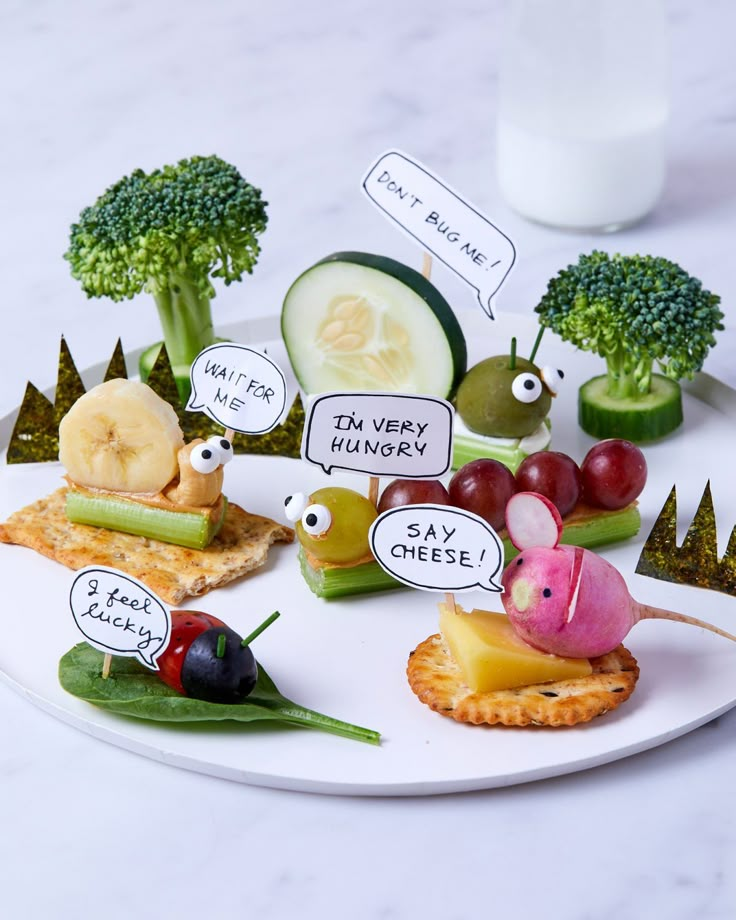 an assortment of food on a plate with words written in small speech bubbles above them