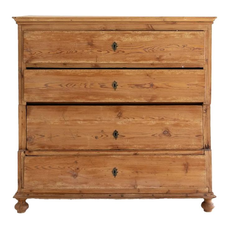 an old wooden dresser with three drawers