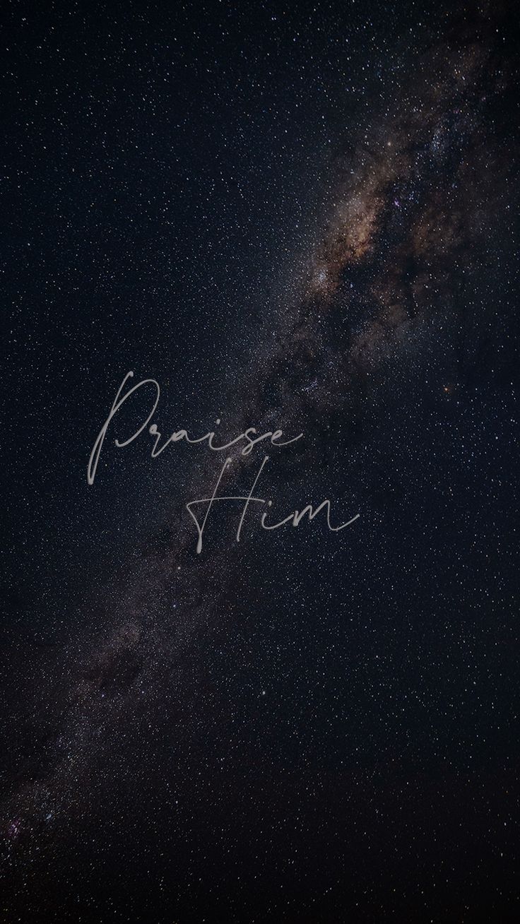 the word pray written in white ink on a dark night sky with stars above it