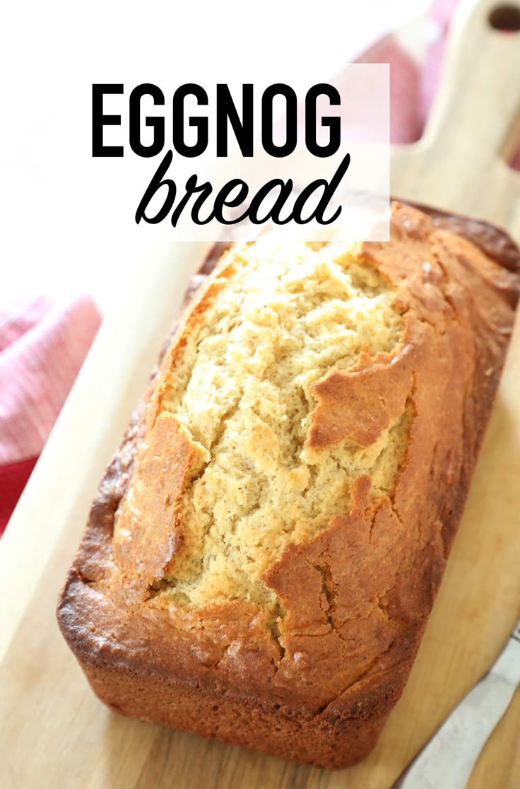 a loaf of eggnog bread sitting on top of a cutting board