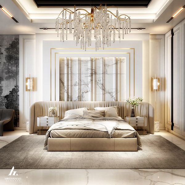 an elegant bedroom with chandelier and bed