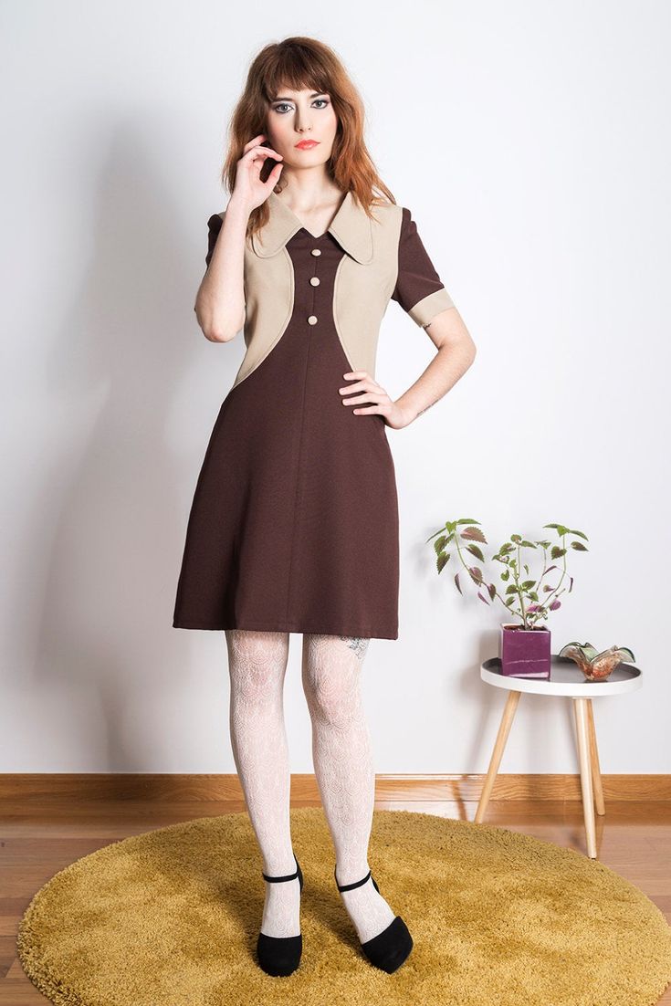 "FARAH DRESS 100% Polyester Colors: brown dressThis dress is made under request, so there is no stock. The item can not be returned, since is only made under request SIZING Choose between the standard size or order your dress made-to-measure, to have the dress made perfectly after your personal measurements. To make sure you fit in the standard size, please check the following measurements: *Sizes inches XS: CHEST 33.07 IN / WAIST 25.98 IN / HIPS 35.43 IN S: CHEST 34.64 IN / WAIST 27.55 IN / HIP Retro A-line Vintage Dress For Work, Retro Fitted Brown Mini Dress, Retro Beige A-line Dress, Retro Brown Dress For Fall, Brown Collared Dress For Work, Collared Brown Dress For Work, Retro Beige Dress For Fall, Retro Dresses With Peter Pan Collar For Vintage Fashion, Brown Vintage Short Sleeve Dress