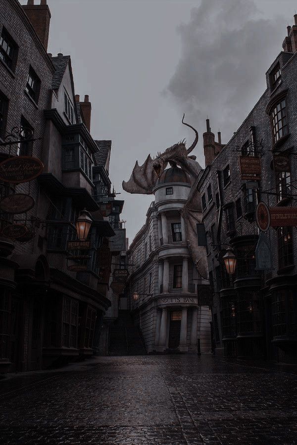 an image of a dragon in the middle of a city street with buildings on either side