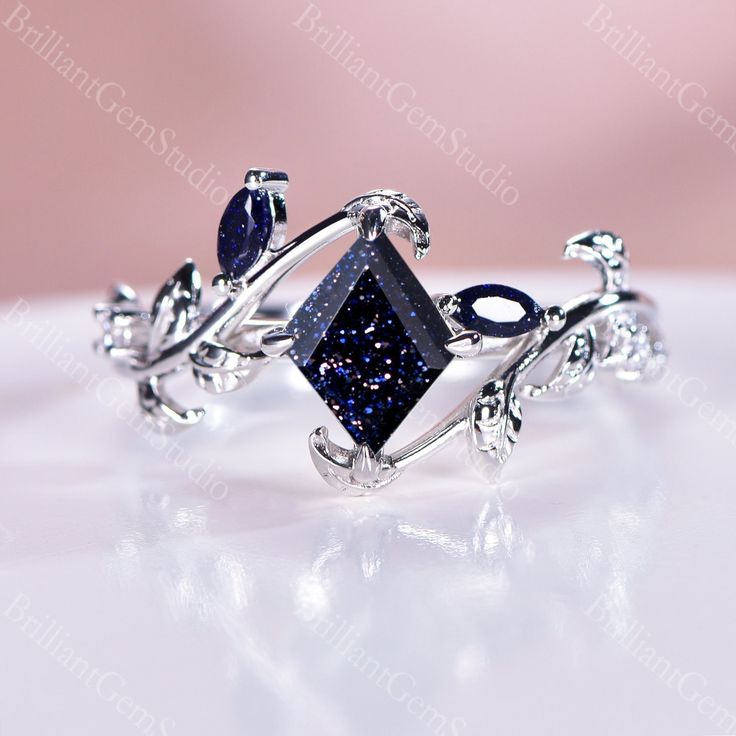 ☆Ring Details☆ Material: Solid 10K/14k/18k Rose Gold/White Gold/Yellow Gold/Black Gold (PLEASE choose silver or platinum if you are allergic to nickel.) ☆Engagement Ring -Center Stone: Blue Sandstone  -Size & Shape: 7x9mm Rhombus -Side Stone: Blue Sandstone & Simulated Diamond / Moissanite / Diamond (Silver Ring will Set With Simulated Diamond Accent/Side Stone) -Shape: Round Cut -Band Width: 1.5mm ☆Service Available☆ ☆Rush Order ☆Payment Plan ☆Engrave Service (should be less than 10 letter) ☆Cu Luxury Moon Phase Rings For Promises, Silver Dimond Rings, Luxury Crystal Promise Ring With Accent Stones, Luxury Gemstones With Accent Stones For Promise, Sapphire Black Wedding Ring, Unique Gemstone Engagement Rings Brilliant Earth, Luxury Celestial Sapphire Ring For Formal Occasions, Luxury Celestial Crystal Promise Ring, Luxury Mystical Style Promise Ring