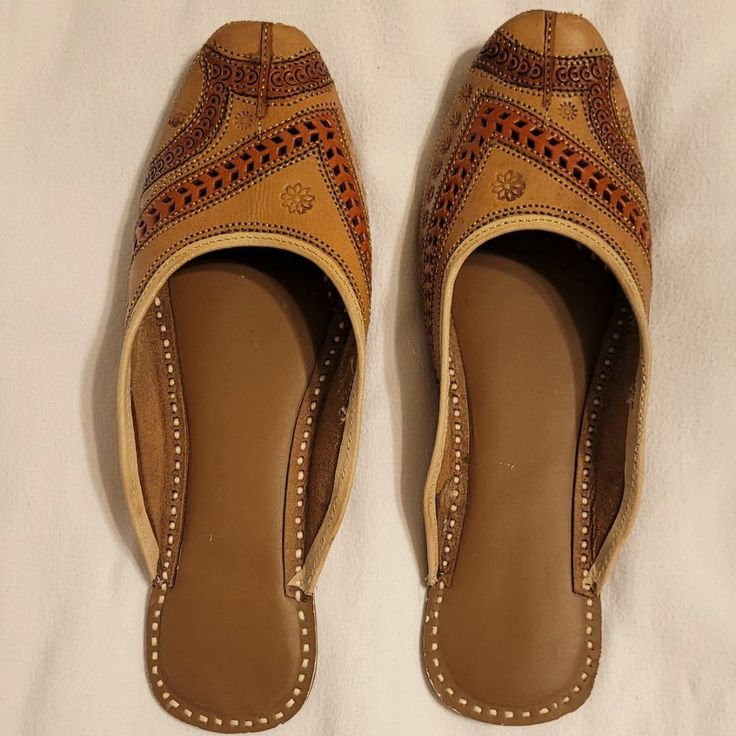 Brand New (Unworn, No Tags) Leather Slippers (Flats) From India -Decorated With Embroidery, And Cut Out Designs -Designs Include Gold Stitching, And Orange/Terra Cotta Colored Designs -Red Bottoms -Handmade Shoes, With Slight Cushion In Sole -Slip-On Style -Due To Handmade Nature -- Sizing Is Approximate. Approximate Size In Us Women's Is Size 8 -Due To Nature Of Pure Leather Material, Leather Will Adapt To You After Wearing Them In Grey Adidas Shoes, Irving Shoes, Kyrie Irving Shoes, Peach Shoes, Curry Shoes, Nike Training Shoes, Blue Slippers, Red Slippers, Fringe Booties