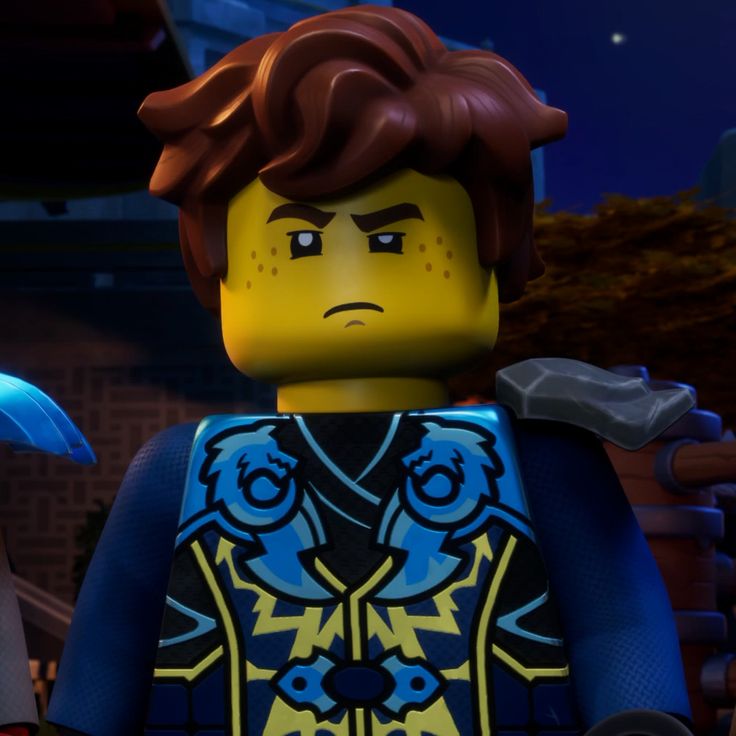 the lego movie character is holding an umbrella