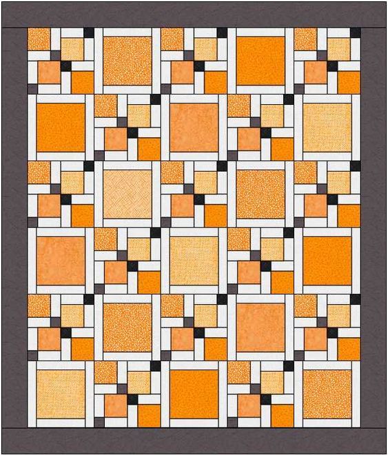 an orange and white quilt with squares on the front, in black and white colors