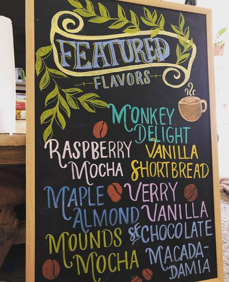 the menu for featured flavors is written on a blackboard