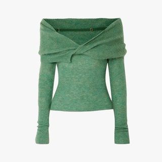 a green sweater with an asymmetric twist