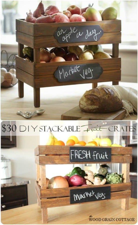 two wooden crates filled with fruits and vegetables on top of a counter next to each other