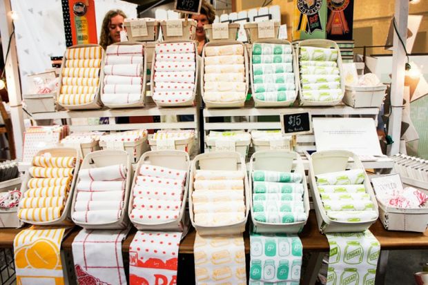 many towels are on display in a store