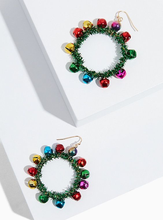 two pairs of christmas wreath earrings with bells on each earring, one is green and the other is multicolored