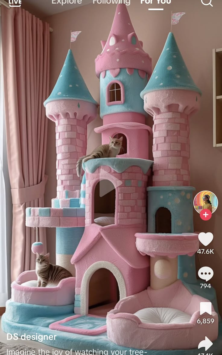 a cat sitting on top of a pink castle bed in a child's bedroom