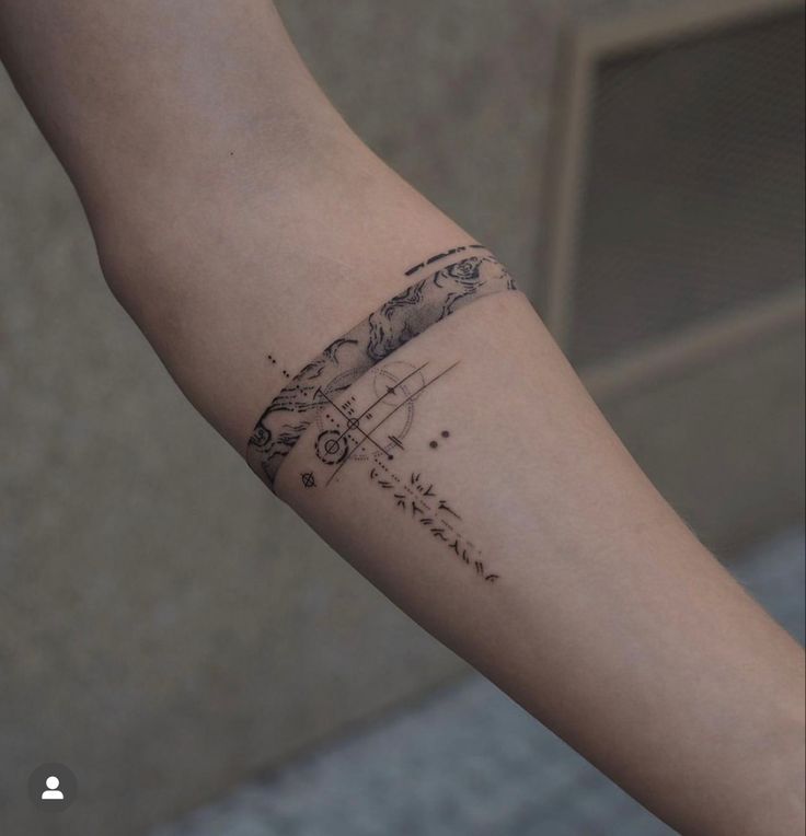 a person with a tattoo on their arm