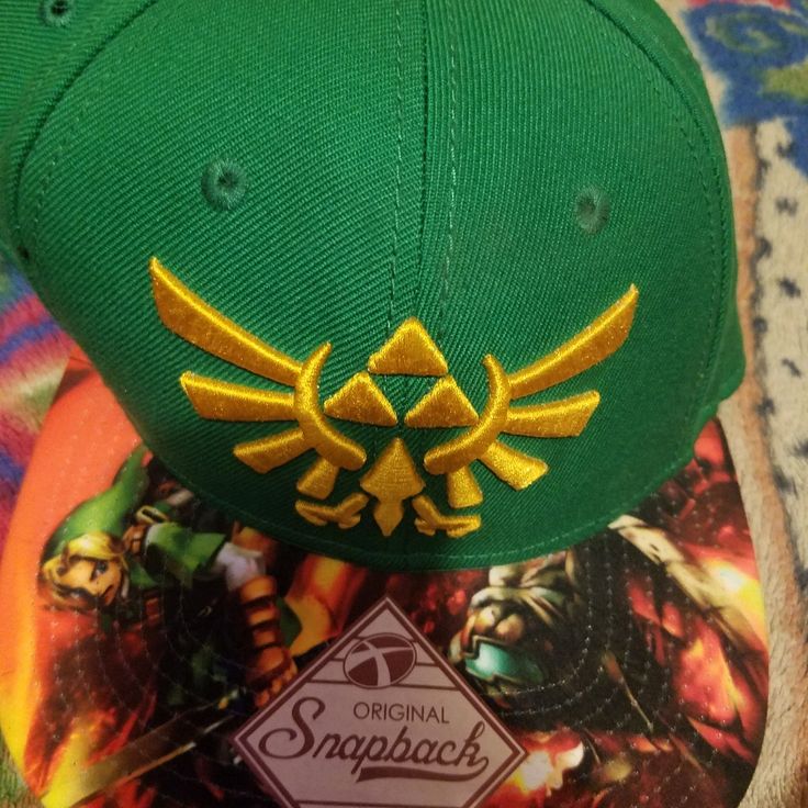 The Legend Of Zelda Ocarina Of Time Hat Zelda Graduation Cap, Zelda Accessories, Mario Cap, Super Mario Hat, Mario Hat, Super Mario Nintendo, Zelda Ocarina Of Time, Nintendo World, Baseball Snapback