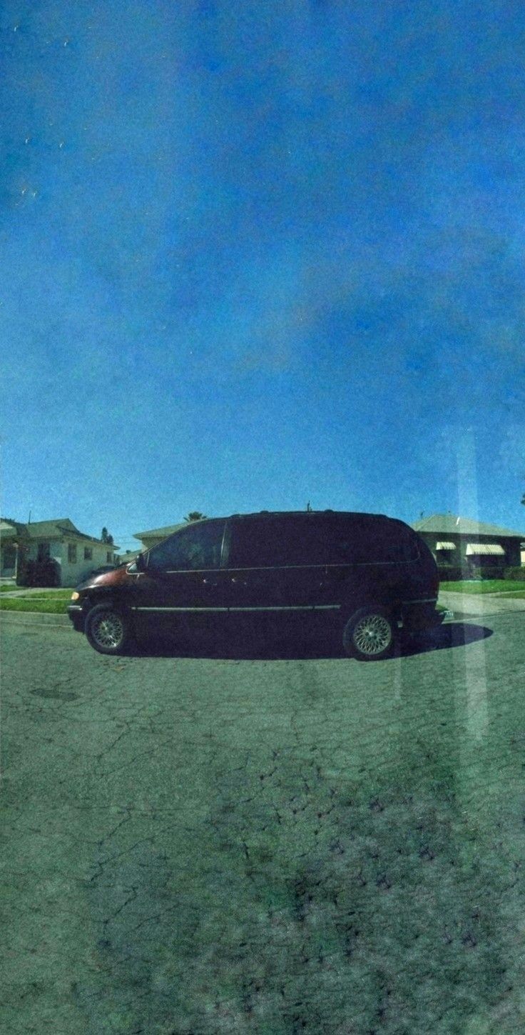 a black van parked in a parking lot