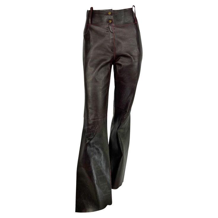 Presenting a fabulous pair of brown/red leather Christian Dior pants designed by John Galliano. From the Fall/Winter 2001 collection, these pants are constructed entirely of brown leather with red undertones that are highlighted when the pants move. These high-waisted pants are made complete with a wide flare cut and slits on either side. A genuinely incredible, these Dior by Galliano leather pants are a must-have addition to any wardrobe. Approximate measurements: Size - FR42/10US Waist: 32" Hi Dior Leather Pants, Formal Leather Brown Bottoms, Formal Brown Leather Bottoms, Elegant Brown Leather Pants Full Length, Elegant Brown Full-length Leather Pants, Elegant Full-length Brown Leather Pants, Elegant Full Length Brown Leather Pants, Elegant Brown Leather Bottoms, Luxury Leather Bottoms For Evening