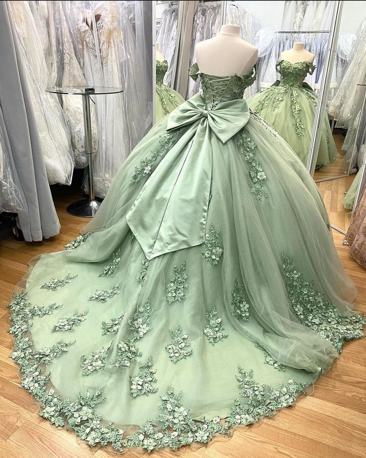 Princess Tiana Dress Quinceanera, Sage Green Debut Gown, Sage Green Sweet 16 Dress, Green Quinceneara Dress, Sage Green Charro Dress, Tinkerbell Quinceanera Dress, Sage Green Quinceanera Dresses Long, Quinceanera Light Green Dresses, Pink And Green Wedding Dress