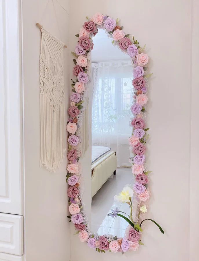 a mirror that has flowers on it