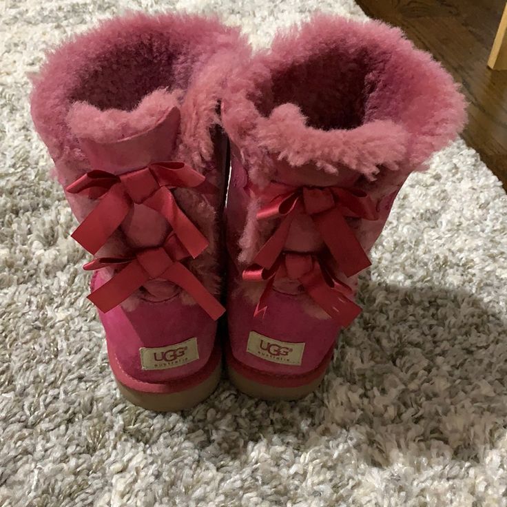 New And Clean Ugh Boots Never Worn Has Bows In The Back So Cute And Love The Color Elliana Aesthetic, Uggs Bow Pink, Pink Ugg With Bows, Pink Uggs Bows, Brown Uggs With Pink Bow, Pink Ugg Boots Ugg, Ugh Boots Bows, Pink Ugg Boots Zappos, Pink Ugg Boots With Bows