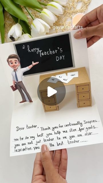 someone is holding up a card with a teacher's day message in front of them