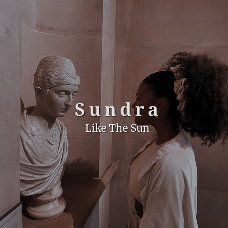 a woman standing next to a statue with the caption sundra like the sun