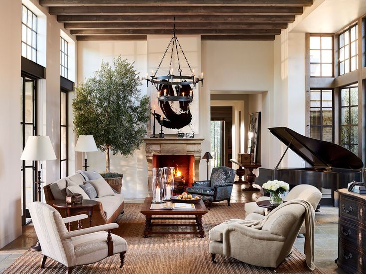 a living room filled with furniture and a piano