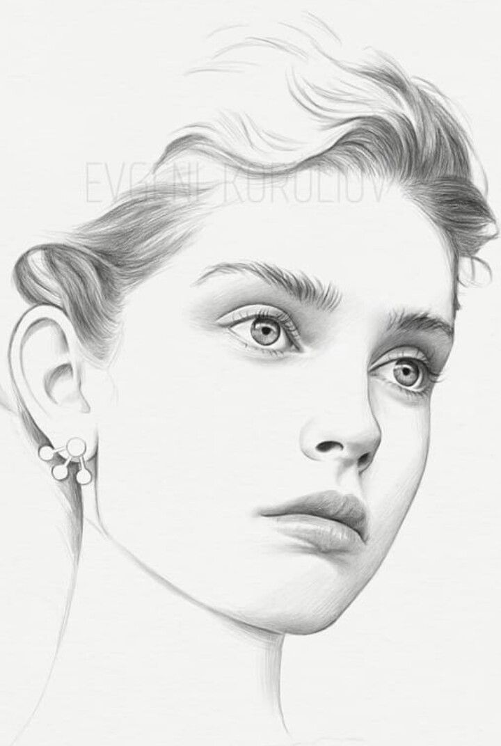 a pencil drawing of a woman's face with earrings on her ear and nose