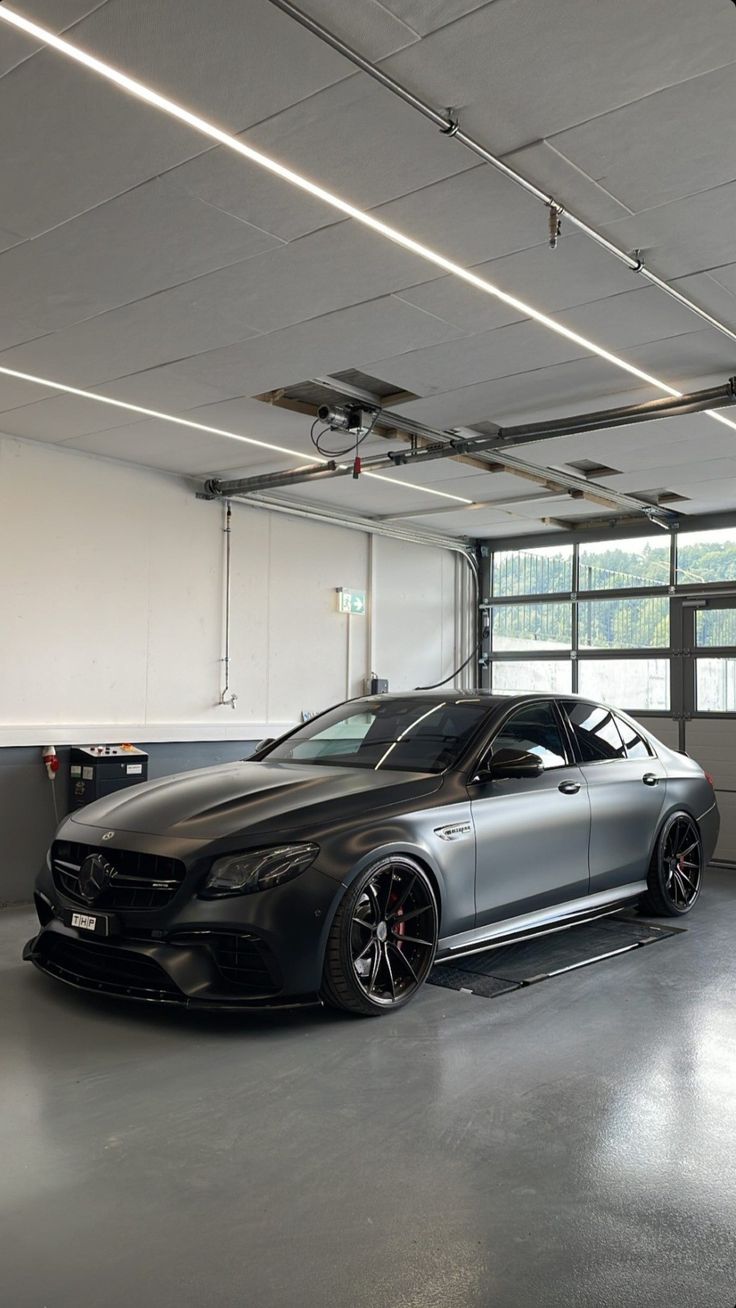 a car parked in a garage with no one around