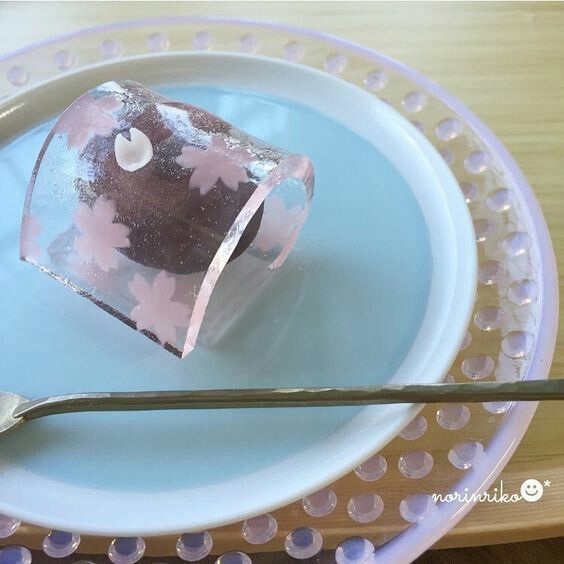 a piece of cake sitting on top of a plate next to a knife and fork