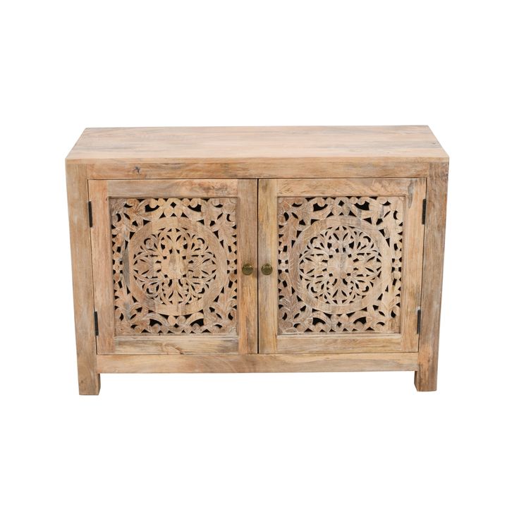 an old wooden cabinet with carvings on the front and side panels, isolated against a white background