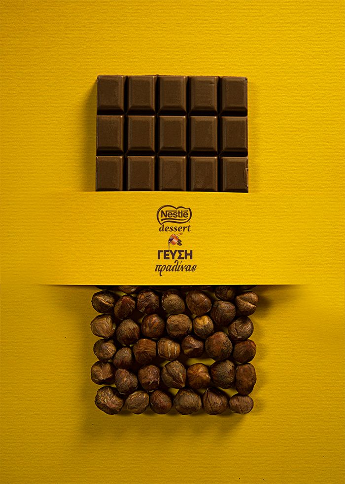 chocolate bar and nuts on yellow background