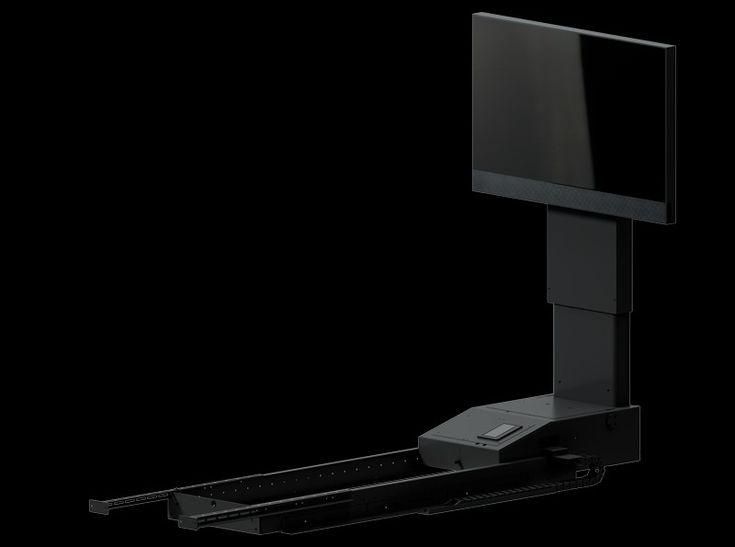 a computer monitor mounted to the side of a black wall