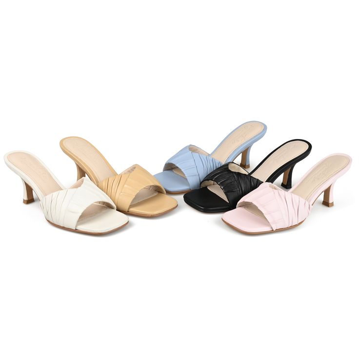 This heeled mule with pleated details and a sweetheart topline is the perfect poised look for summer.  • Open Toe  • Slip-On Silhouette  • 4 mm Tru Comfort Foam™ Footbed  • 3- in Stiletto Heel  • Genuine Leather Uppers  All measurements are approximate and were taken using a size 6. Please note measurements may vary slightly by size. Heeled Mule, Heel Mules, Journee Collection, Warm Weather, Open Toe, Stiletto Heels, Leather Upper, Genuine Leather, Slip On