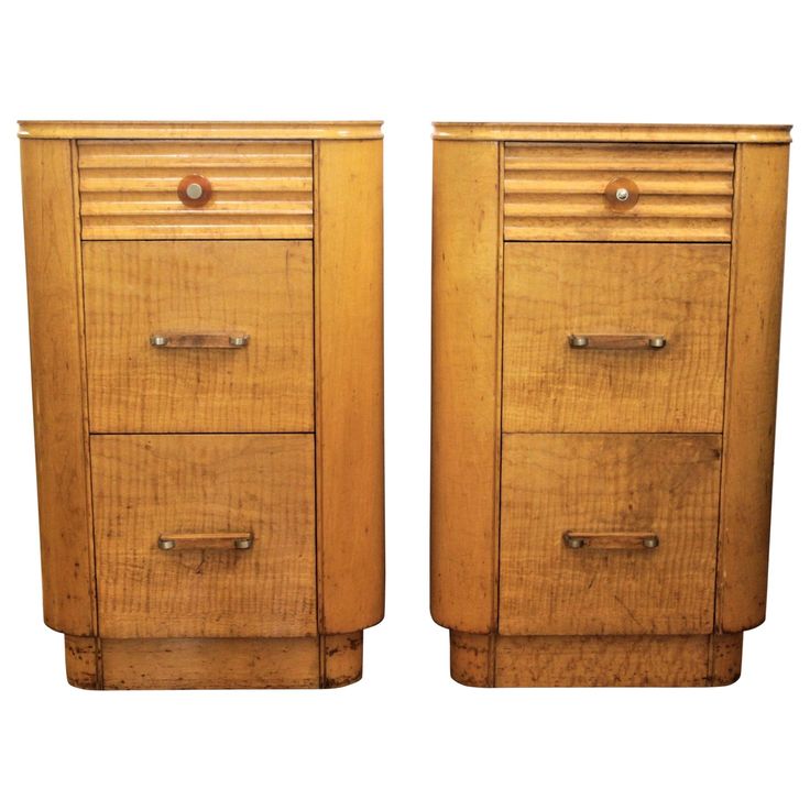 two wooden drawers sitting next to each other