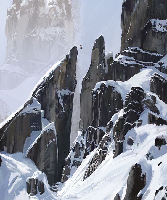 a man riding skis down the side of a snow covered mountain next to tall rocks