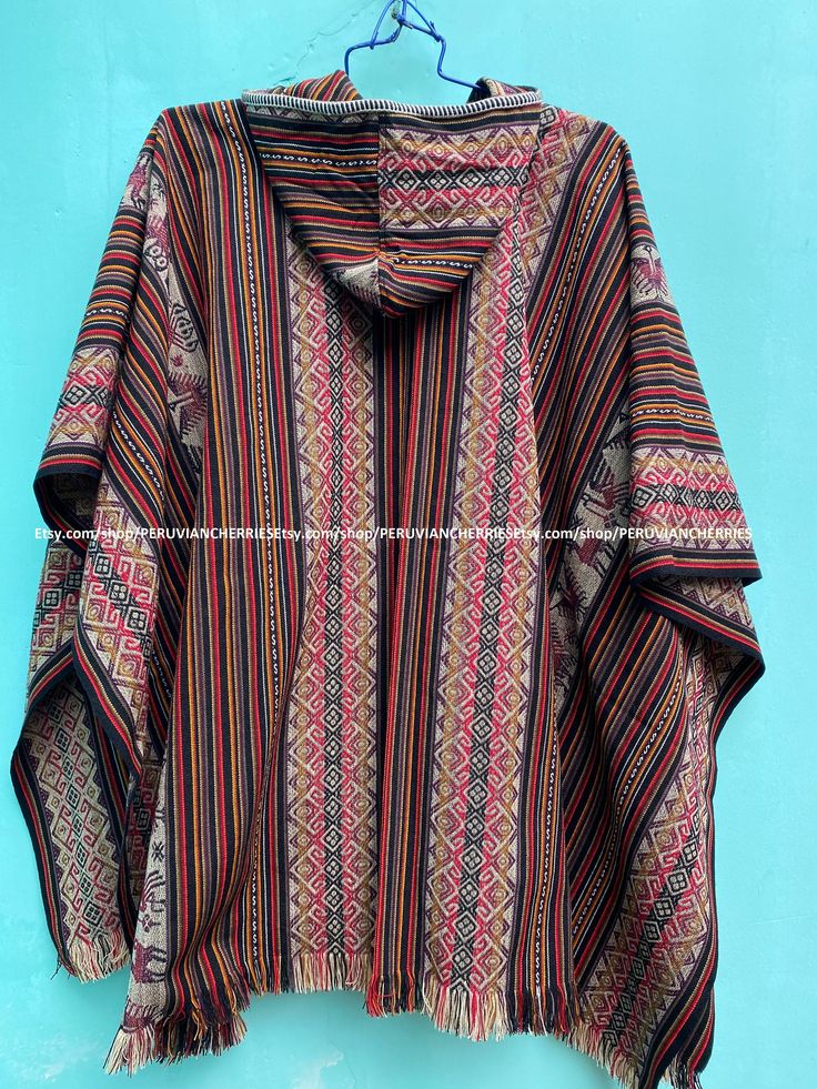 "EXPRESS SHIPPING! USA, CANADA, EUROPE AND AMERICA - 4 DAYS TO 8 DAYS MAXIMUM EXPRESS SHIPPING! ASIA, AFRICA AND OCEANIA - 4 DAYS TO 8 DAYS MAXIMUM Our traditional poncho has been made with the quality and rustic appereance of the natural Alpaca and designed in a very particular and nice style. Its an original versatile garment from the andes of Peru! MATERIAL: Alpaca Wool. Alpaca Wool is hypoallergenic, light and warm. Its fibers contain microscopic air bags that make the garments light and del Traditional Handwoven Poncho For Fall, Traditional Long Sleeve Poncho, One Size, Traditional Long Sleeve Poncho One Size, Traditional Long Sleeve Poncho, Bohemian Alpaca Shawl, Traditional Alpaca Poncho For Fall, Bohemian Alpaca Shawl Cape, Bohemian Handwoven Poncho For Winter, Traditional One-size Long Sleeve Cape