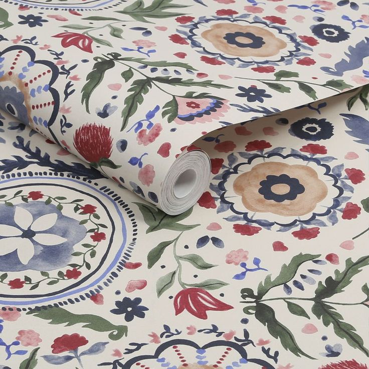 a floral wallpaper with blue, red and pink flowers on white groundcloths