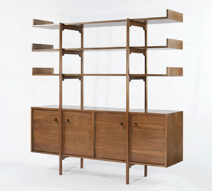 a wooden bookcase with drawers and shelves on each side, against a white background