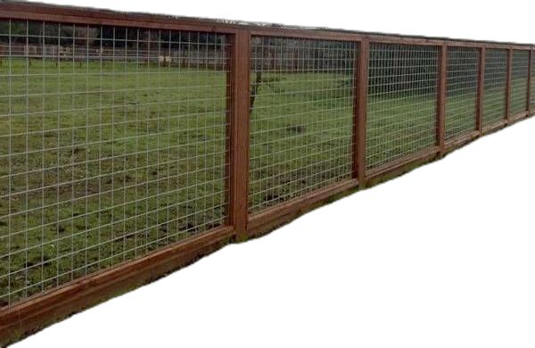 a fence that is in the middle of a field