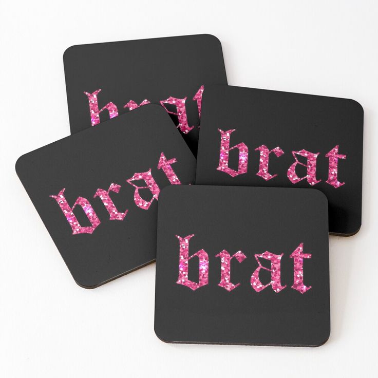 four coasters with pink glitter letters on them